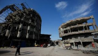 مبان دمرت جراء الاشتباكات في الموصل