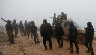 مقاتلون حشدتهم تركيا لهجوم عفرين - رويترز