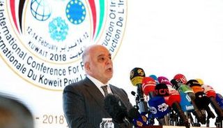 حيدر العبادي خلال مشاركته بمؤتمر إعادة إعمار العراق بالكويت- أ.ف.ب