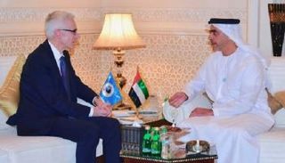 سيف بن زايد خلال لقائه مع أمين عام الإنتربول