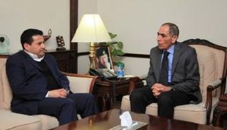 وزير الداخلية الأردني غالب الزعبي ونظيره العراقي قاسم الأعرجي