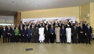 صورة تذكارية للمشاركين في اجتماع بروكسل