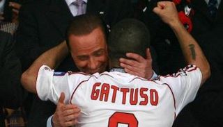 سيلفيو بيرلسكوني وجينارو جاتوزو