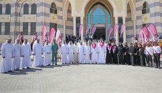 صورة جماعية مع دائرة التنمية الاقتصادية بأم القيوين