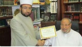 القرضاوي مجتمعا بالقيادي في منظمة الرائد بأوكرانيا عماد الرب
