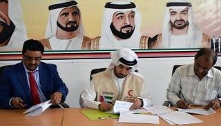 أثناء توقيع الاتفاقية