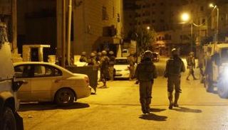 قوات الاحتلال خلال عملية الاعتقال