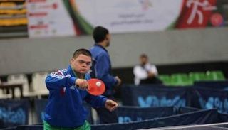 طفل مصاب بمتلازمة داون يشارك في الأولمبياد الخاص