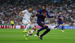 بيكيه وبنزيمة لاعب ريال مدريد