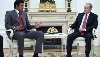 بوتين وتميم في لقاء سابق