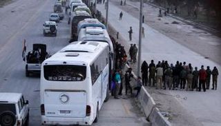 إجلاء الآلاف من مقاتلي المعارضة من مدينة حرستا 