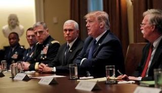 ترامب خلال اجتماعه مع القادة العسكريين‎‎ - رويترز