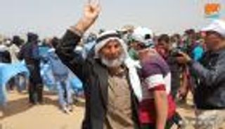 بالصور.. نساء وشيوخ غزة على خط النار: عائدون لبلادنا 