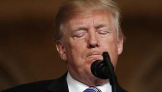 مزاعم التدخل الروسي ما زالت تطارد ترامب - رويترز