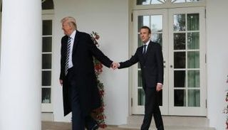 ترامب وماكرون- أ.ف.ب