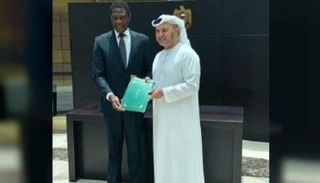 الدكتور أنور قرقاش وبول ماشاتيلي
