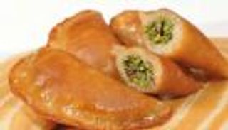 طريقة عمل القطايف بالقشطة.. زينة الموائد الرمضانية