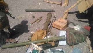 أسلحة وأوراق كانت بحوزة الإرهابيين 