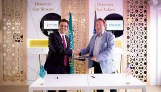 أحمد المزيد وريتش غيلفوند الرئيس التنفيذي لـ«آيماكس» 