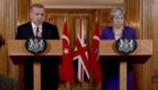 ماي تحذر أردوغان من التمادي في قمع المعارضين