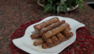 بالصور.. "السِّيجار" أشهر حلويات السهرات الرمضانية في الجزائر