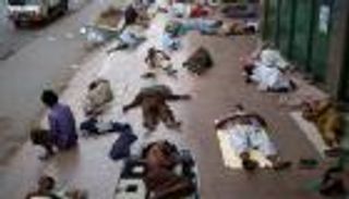 بالصور.. كيف واجه سكان كراتشي درجة الحرارة القاتلة؟