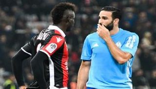 عادل رامي وماريو بالوتيلي 