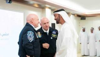  الشيخ محمد بن زايد آل نهيان برفقة رائدي الفضاء 