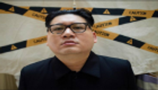 سنغافورة تحتجز فنانا كوميديا يقلد زعيم كوريا الشمالية 