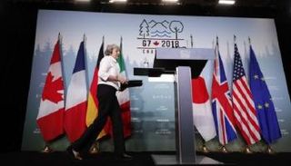 تيريزا ماي خلال مشاركتها في اجتماع قمة الدول السبع