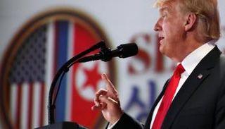 الرئيس الأمريكي خلال المؤتمر الصحفي- رويترز