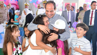 الرئيس السيسي خلال احتفالية عيد الفطر مع أسر الشهداء والمصابين