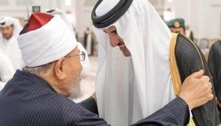 تميم بن حمد ويوسف القرضاوي