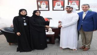 جانب من تسليم شهادات اعتماد نظام إدارة السلامة والصحة المهنية