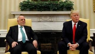 ترامب والعبادي في لقاء سابق- أرشيفية