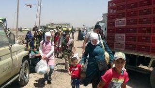 نازحون سوريون من درعا جراء القصف