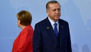صورة أرشيفية لميركل وأردوغان - أ. ف. ب
