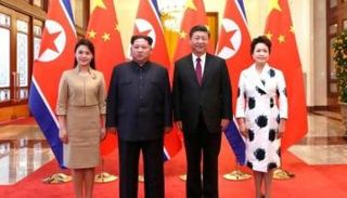 صورة تذكارية تجمع الرئيس الصيني وكيم - أرشيفية