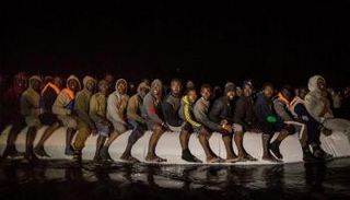 مهاجرون غير شرعيين اعتقلوا في ليبيا -  أرشيفية