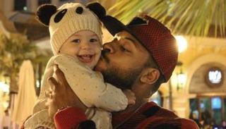 البطل السوداني محمد عبد اللطيف مع نجلته