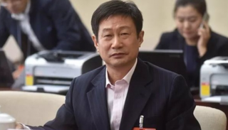 الإعلامي الصيني حسن وانغ ماو هو 