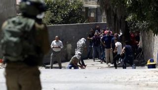 مواجهات بين مصلين فلسطينيين وقوات الاحتلال في المسجد الأقصى - أ. ف. ب