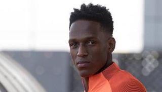 ياري مينا لاعب برشلونة