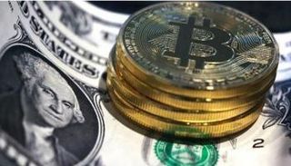 بيتكوين تهبط