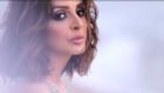 بالصور.. أنغام تشوق جمهورها بالضباب