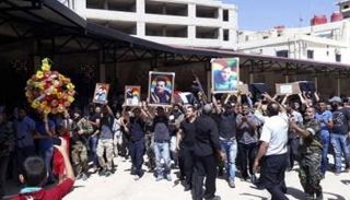 أهالي السويداء يشيعون قتلى تفجيرات داعش