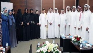 صورة جماعية للمشاركين في الأمسية التأبينية