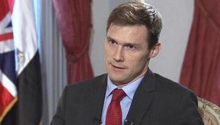  السفير البريطاني لدى القاهرة جون كاسن