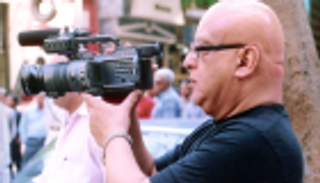 "خيط الحرير".. قصة زواج مصرية من صيني تعيد خيري بشارة للسينما  