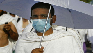 الصحة السعودية تحث الحجاج على استخدام الكمامات 